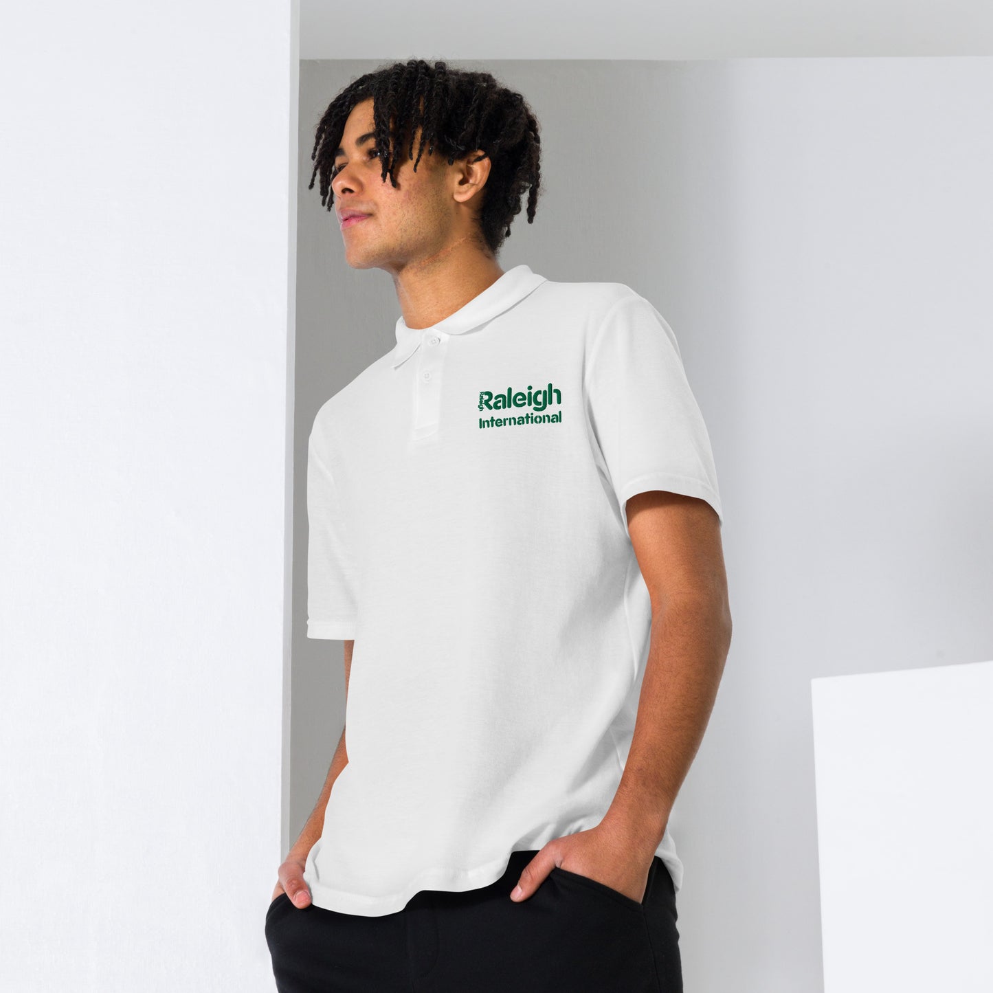 Raleigh unisex polo shirt (green logo)